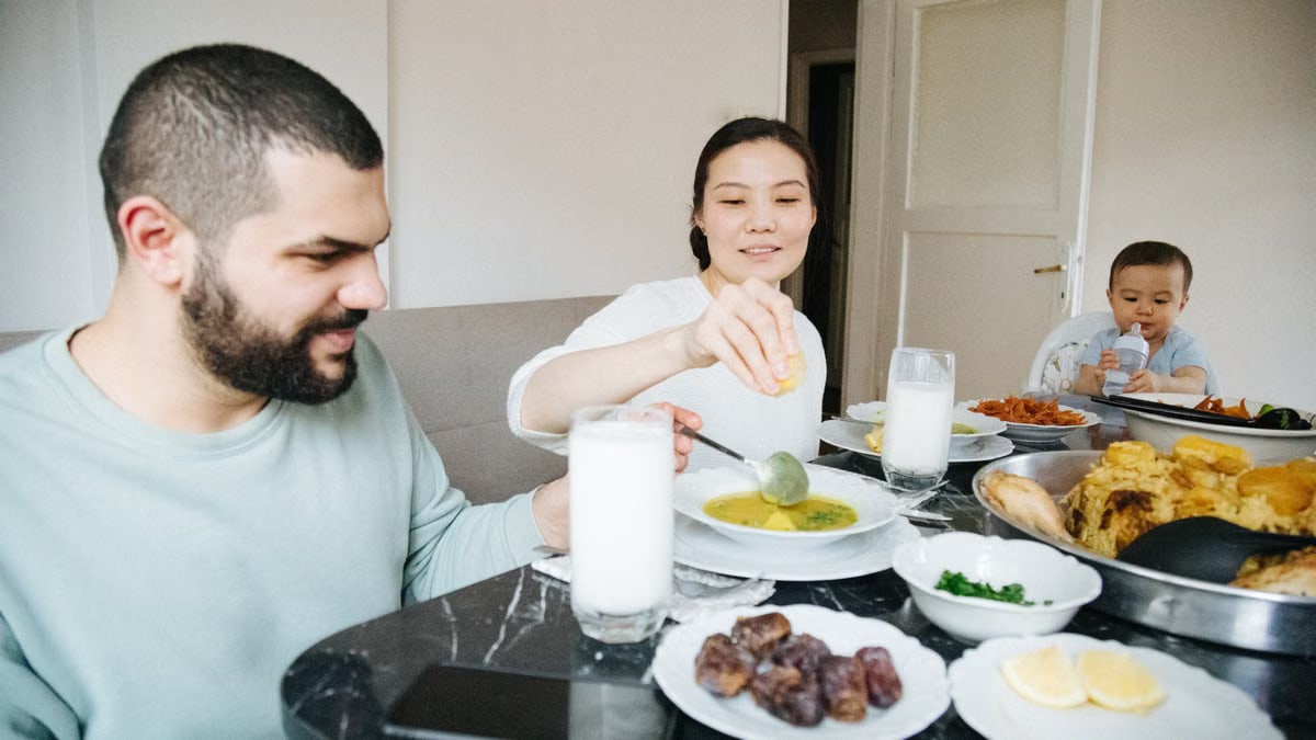 A family dining together at home with traditional Turkish dishes in Istanbul.